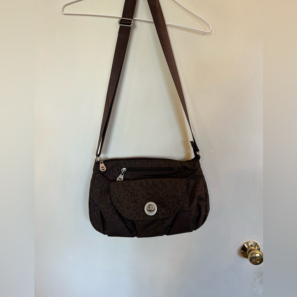 Brown and black cross body Baggallini animal, print multiple compartment bag